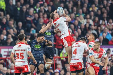 Joe Burgess of Hull KR jumps up to win the high ball during the 2025 Betfred Super League Grand Final Hull KR v Wigan Warriors at Old Trafford, Manchester, United Kingdom, 11th October 2025   
