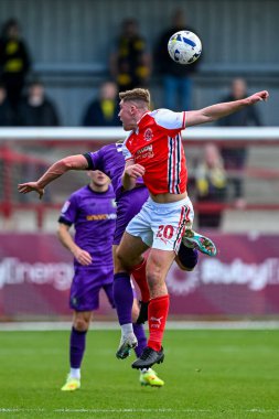 Bobby Faulkner of Harrogate Town  challenges for a header during the Sky Bet League 2 match Fleetwood Town vs Harrogate Town at Highbury Stadium, Fleetwood, United Kingdom, 11th October 2025 