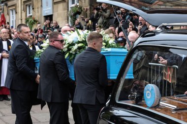 Richard John Hatton MBEs coffin is placed in the hearse by family members after his funeral service has been conducted during Ricky Hatton' Funeral at Manchester Cathedral, Manchester, United Kingdom, 10th October 2025 