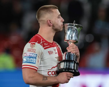 Mikey Lewis of Hull KR reads the names of previous winners of the man of the match trophy during the 2025 Betfred Super League Grand Final Hull KR v Wigan Warriors at Old Trafford, Manchester, United Kingdom, 11th October 2025