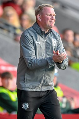 Pete Wild, manager of Fleetwood Town,  claps during the Sky Bet League 2 match Fleetwood Town vs Harrogate Town at Highbury Stadium, Fleetwood, United Kingdom, 11th October 2025 