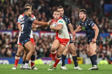 Mikey Lewis of Hull KR evades a tackle during the 2025 Betfred Super League Grand Final Hull KR v Wigan Warriors at Old Trafford, Manchester, United Kingdom, 11th October 2025 