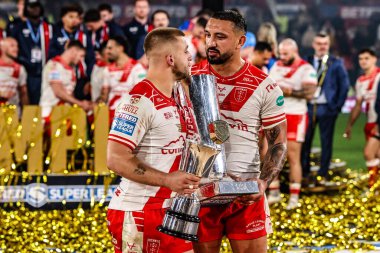 Mikey Lewis of Hull KR and Elliot Minchella of Hull KR celebrate winning the Grand Final during the 2025 Betfred Super League Grand Final Hull KR v Wigan Warriors at Old Trafford, Manchester, United Kingdom, 11th October 2025