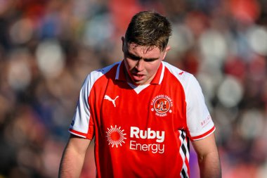Harrison Neal of Fleetwood Town  looking down during the Sky Bet League 2 match Fleetwood Town vs Harrogate Town at Highbury Stadium, Fleetwood, United Kingdom, 11th October 2025  