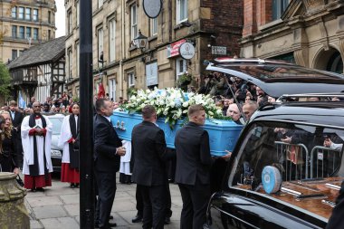 Richard John Hatton MBEs coffin is placed in the hearse by family members after his funeral service has been conducted during Ricky Hatton' Funeral at Manchester Cathedral, Manchester, United Kingdom, 10th October 2025 