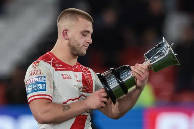 Mikey Lewis of Hull KR reads the names of previous winners of the man of the match trophy during the 2025 Betfred Super League Grand Final Hull KR v Wigan Warriors at Old Trafford, Manchester, United Kingdom, 11th October 2025