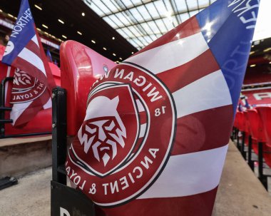 Wigan Warriors flags are placed on every seat during the 2025 Betfred Super League Grand Final Hull KR v Wigan Warriors at Old Trafford, Manchester, United Kingdom, 11th October 2025 