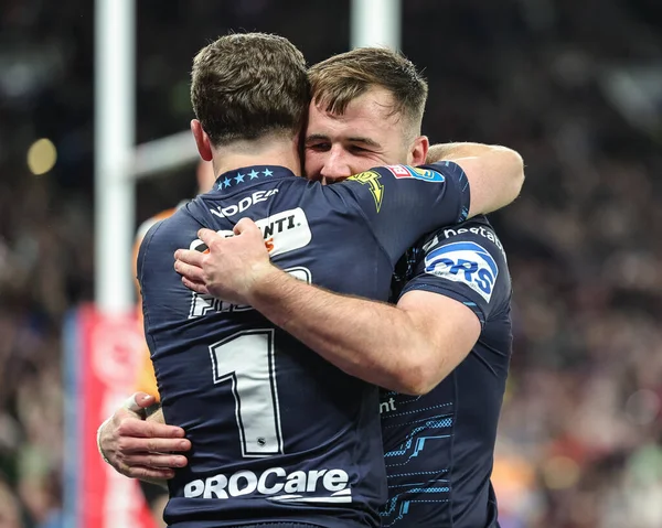 Harry Smith of Wigan Warriors celebrates his try during the 2025 Betfred Super League Grand Final Hull KR v Wigan Warriors at Old Trafford, Manchester, United Kingdom, 11th October 2025 