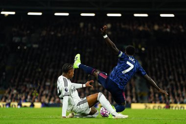 18 Ekim 2025 'te Craven Cottage, Londra' da oynanan Premier League maçında Arsenal 'den Bukayo Saka ve Fulham' dan Kevin 'in oynadığı penaltı kazası. 