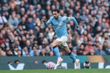 Manchester City 'den Bernardo Silva, 18 Ekim 2025 tarihinde Etihad Stadyumu' nda oynanan Premier League maçında topu aldı. 