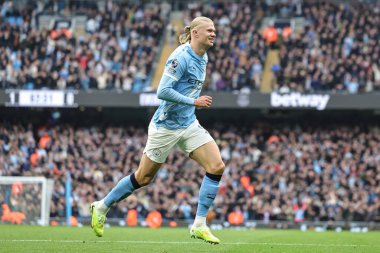 Manchester City 'den Erling Haaland, 18 Ekim 2025' te Etihad Stadyumu 'nda oynanan Premier League maçında 2-0' lık galibiyet golünü kutluyor. 