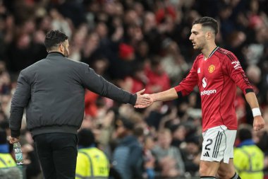 Manchester United 'ın Ruben Amorim teknik direktörü ve Manchester United' ın Diogo Dalot 'u Manchester United ile Manchester United arasındaki Premier League maçında Bryan Mbeumo' nun golünü kutladılar.