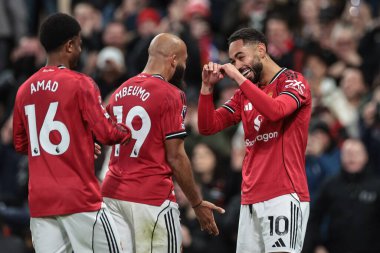 Manchester United takımından Matheus Cunha, Manchester United ve Hove Albion maçında takım arkadaşlarıyla 25 Ekim 2025 'te Old Trafford, Manchester' da oynanan Premier League maçında 1-0 'lık galibiyetini kutluyor. 