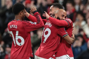 Manchester United takımından Matheus Cunha, Manchester United ve Hove Albion maçında takım arkadaşlarıyla 25 Ekim 2025 'te Old Trafford, Manchester' da oynanan Premier League maçında 1-0 'lık galibiyetini kutluyor.