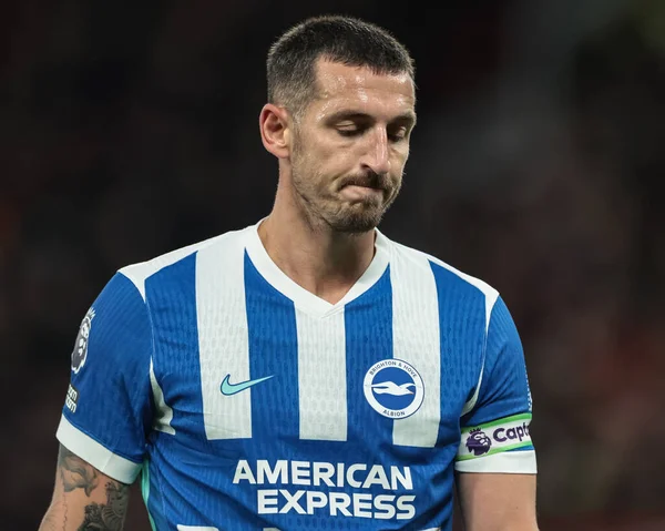 Premier Lig karşılaşmasında Brighton & Hove Albion 'dan Lewis Dunk Manchester United ve Hove Albion' a karşı Old Trafford, Manchester, İngiltere, 25 Ekim 2025