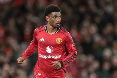 Manchester United takımından Amad Diallo, Manchester United ve Hove Albion maçında 25 Ekim 2025 'te Old Trafford, Manchester' da topa vurdu. 