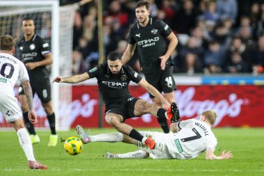 Manchester City 'den Rayan At-Nouri, 29 Ekim 2025' te Swansea.com Stadyumu 'nda oynanan Carabao Kupası son 16 Swansea City ile Manchester City maçında Swansea City' li Melker Widell tarafından yenildi. 