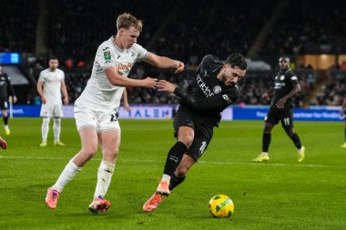 Manchester City 'den Rayan Cherki, Swansea City' den Kaelan Casey 'nin baskısı altında Carabao Kupası' nda son 16 Swansea City Manchester City 'ye karşı Swansea.com Stadyumu, Swansea, Birleşik Krallık, 29 Ekim 2025