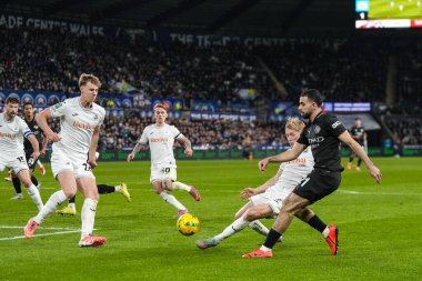 Manchester City 'den Rayan At-Nouri, 29 Ekim 2025' te Swansea.com Stadyumu 'nda son 16 Swansea City ile Manchester City arasındaki Carabao Kupası' nda topu çaprazlıyor. 