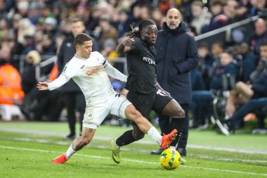 Manchester City 'den Jrmy Doku, 29 Ekim 2025' te Swansea City, Swansea.com Stadyumu 'nda oynanan Carabao Kupası' nda Swansea City 'den Manuel Benson' a yenildi.