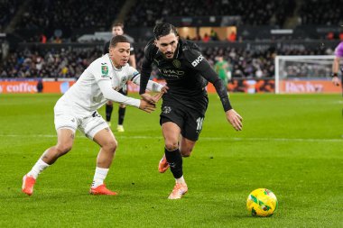 Manchester City 'den Rayan Cherki, Swansea City' den Manuel Benson 'ın baskısı altında Carabao Kupası son 16 Swansea City ile Manchester City Swansea.com Stadyumu, Swansea, Birleşik Krallık, 29 Ekim 2025