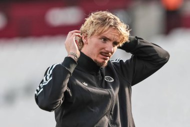 Newcastle United takımından Nick Woltemade, Premier League maçı sırasında Londra Stadyumu 'nda West Ham United' a karşı Newcastle United maçında saçını dikti.