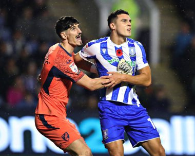 Sheffield 'li Bailey Cadamarteri Çarşamba günü Norwich City' li Vladan Kovaceviç ile 5 Kasım 2025 'te Sheffield City' deki Norwich City 'ye karşı Çarşamba günü oynanan Gökyüzü İddia Şampiyonası maçında mücadele etti. 