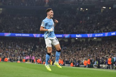 Manchester City 'den Phil Foden, 5 Kasım 2025' te Manchester City 'deki Borussia Dortmund' a karşı oynanan UEFA Şampiyonlar Ligi 4. Maçı 'nda 3-0' lık galibiyetini kutluyor. 