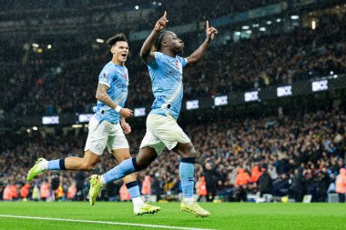 Manchester City 'den Jeremy Doku, 9 Kasım 2025 tarihinde Etihad Stadyumu' nda oynanan Premier League maçında 3-0 'lık skorla Manchester City-Liverpool maçını kutluyor. 