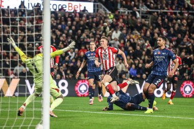 Sunderland 'dan Daniel Ballard, 8 Kasım 2025' te İngiltere 'nin Sunderland kentinde oynanan Premier League maçında Sunderland-Arsenal maçında 1-0 kazanma hedefini kutluyor. 