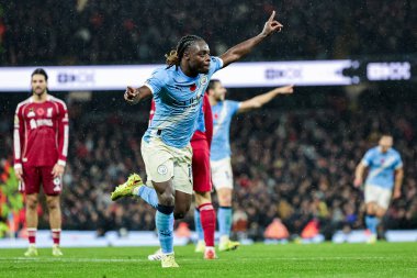 Manchester City 'den Jeremy Doku, 9 Kasım 2025 tarihinde Etihad Stadyumu' nda oynanan Premier League maçında 3-0 'lık skorla Manchester City-Liverpool maçını kutluyor. 