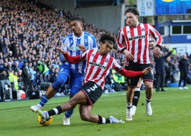 Sheffield United takımından Sam McCallum, Sheffield, Sheffield, İngiltere 'de 23 Kasım 2025' te Sheffield United 'a karşı Çarşamba günü oynanan Gökyüzü İddia Şampiyonası maçında Sheffield United' ı kaydırak kaydırağıyla yendi.