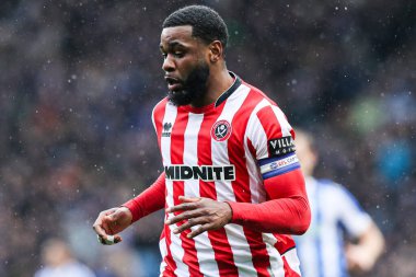 Sheffield United takımından Japhet Tanganga, Sheffield United 'a karşı 23 Kasım 2025' te Sheffield Wednesday 'in Hillsborough, Sheffield United maçında karşı karşıya geldi.