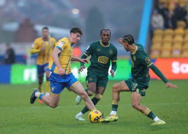 Mansfield Town 'dan Joe Gardner, Mansfield Stadyumu, Mansfield, Birleşik Krallık' ta 22 Kasım 2025 'te oynanan Sky Bet League 1 karşılaşmasında Huddersfield Town' a karşı Ruben Roosken tarafından yenildi.