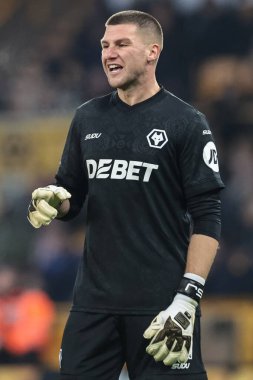 Wolverhampton Wanderers kalecisi Sam Johnstone, Premier League maçında Wolverhampton Wanderers, Molineux, Wolverhampton, İngiltere 'deki Crystal Palace' a karşı 22 Kasım 2025 'de takım talimatlarını verir.