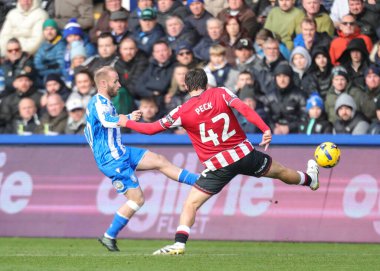 Sheffield Wednesday 'den Barry Bannan, Sheffield United' a karşı 23 Kasım 2025 'te Sheffield United' ın oynadığı Gökyüzü İddia Şampiyonası maçında pas attı.