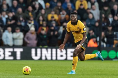 Wolverhampton Wanderers takımından Marshall Munetsi, 22 Kasım 2025 tarihinde İngiltere 'nin Wolverhampton kentinde oynanan Premier League maçında Wolverhampton Wanderers' ın Crystal Palace 'a karşı oynadığı maçta topu aldı.
