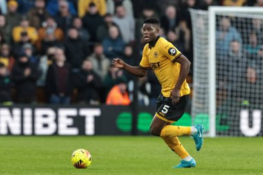 Wolverhampton Wanderers takımından Marshall Munetsi, 22 Kasım 2025 tarihinde İngiltere 'nin Wolverhampton kentinde oynanan Premier League maçında Wolverhampton Wanderers' ın Crystal Palace 'a karşı oynadığı maçta topu aldı.