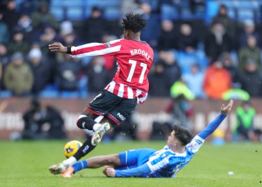 Sheffield 'lı Harry Amass, Sheffield United' ın Sheffield United maçında Sheffield United 'a karşı 23 Kasım 2025' te Hillsborough, Sheffield, İngiltere 'de oynanan maçta slayt kaydıyla kayıyor.