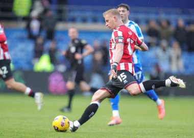 Sheffield United takımından Ben Mee, 23 Kasım 2025 'te Sheffield United' a karşı oynanan Çarşamba günü Sheffield United maçında topu sahaya çıkardı.