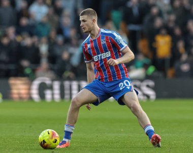 Kristal Saray 'dan Adam Wharton Premier Lig maçında topla Wolverhampton Wanderers, Molineux, Wolverhampton' daki Crystal Palace 'a karşı 22 Kasım 2025