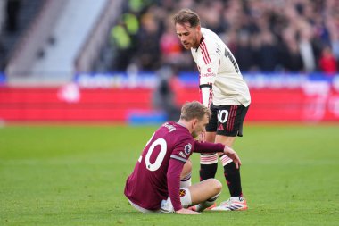 Liverpool 'dan Alexis Mac Allister, 30 Kasım 2025' te Londra 'daki Londra Stadyumu' nda oynanan Premier League maçında West Ham United ve Liverpool maçında Jarrod Bowen 'a yardım etti. 