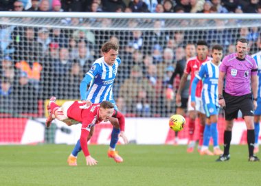 Nottingham Ormanı 'ndan Elliot Anderson 30 Kasım 2025' te İngiltere 'nin Nottingham şehrinde oynanan Premier League maçında Nottingham Forest, Brighton ve Hove Albion' a karşı oynuyor. 