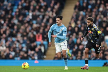 Manchester City 'den Tijjani Reijnders, Manchester City ile Leeds United' ın 29 Kasım 2025 'te Etihad Stadyumu' nda oynanan Premier League maçında topu bırakıyor. 