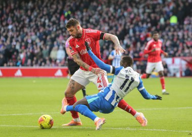 Brighton & Hove Albion takımından Yankuba Minteh, Nottingham Forest - Brighton ve Hove Albion maçlarında Nottingham Ormanı 'ndan Morato tarafından 30 Kasım 2025' de City Ground, Nottingham, İngiltere 'de oynandı. 
