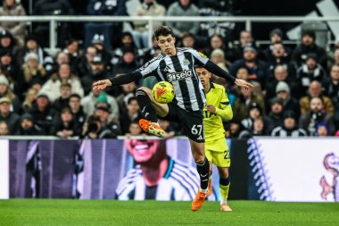 Lewis Miley of Newcastle United controls the ball during the Premier League match Newcastle United vs Tottenham Hotspur at St. James's Park, Newcastle, United Kingdom, 2nd December 2025 