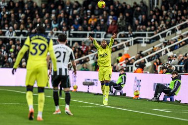 Destiny Udogie of Tottenham Hotspur takes a throw in during the Premier League match Newcastle United vs Tottenham Hotspur at St. James's Park, Newcastle, United Kingdom, 2nd December 2025 