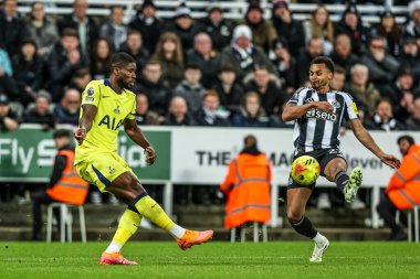 Kevin Danso of Tottenham Hotspur clears the ball during the Premier League match Newcastle United vs Tottenham Hotspur at St. James's Park, Newcastle, United Kingdom, 2nd December 2025 