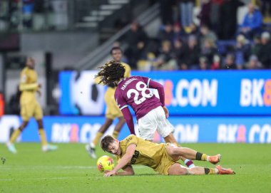 Justin Devenny of Crystal Palace slides in on Hannibal Mejbri of Burnley during the Premier League match Burnley vs Crystal Palace at Turf Moor, Burnley, United Kingdom, 3rd December 2025 