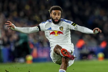 Jayden Bogle of Leeds United slips as he passes the ball during the Premier League match Leeds United vs Chelsea at Elland Road, Leeds, United Kingdom, 3rd December 2025 